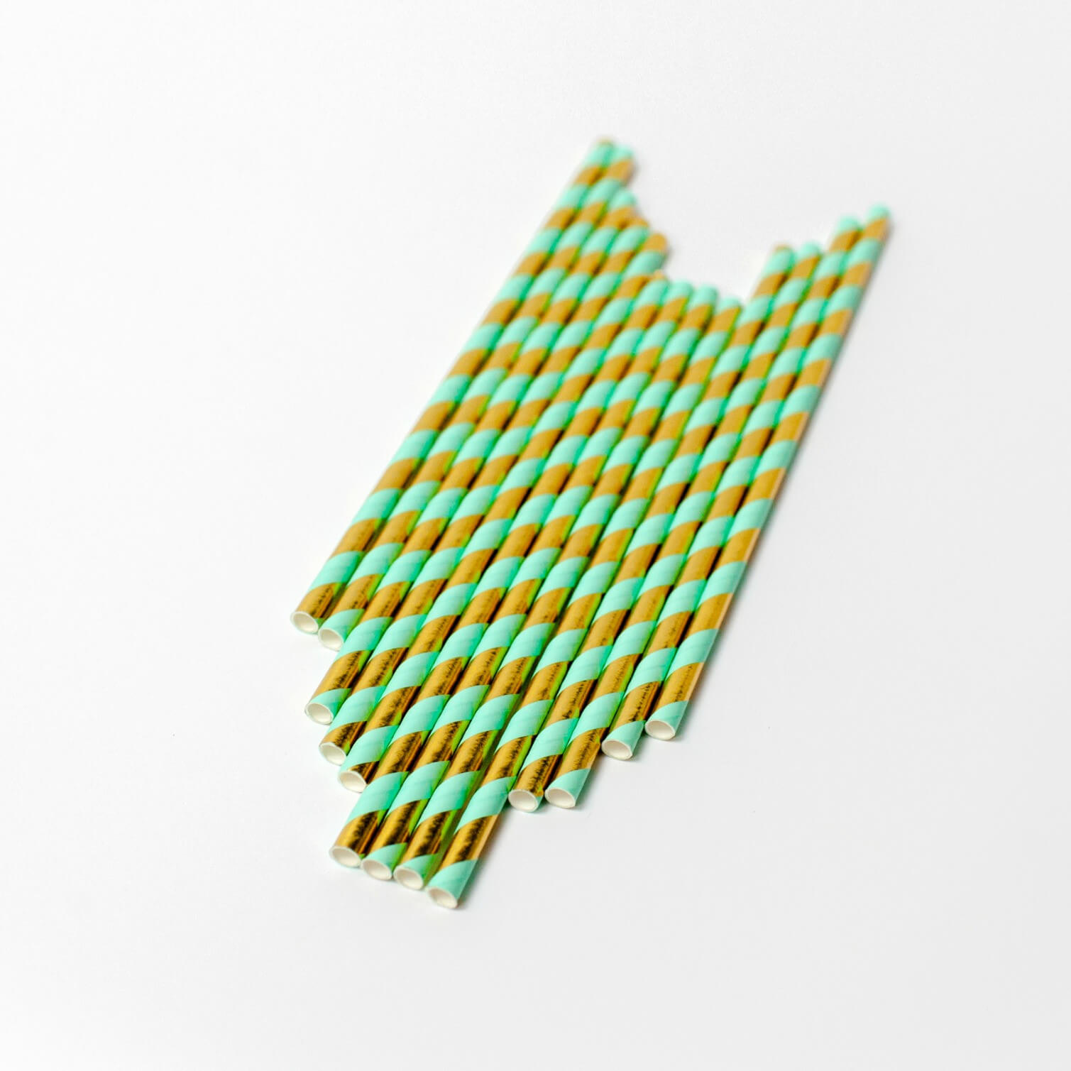 Green and gold paper straws